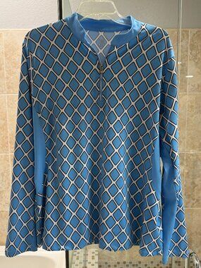 Tail Size XXL Blue and white with black shirt like new, hardly worn. Long Sleeve